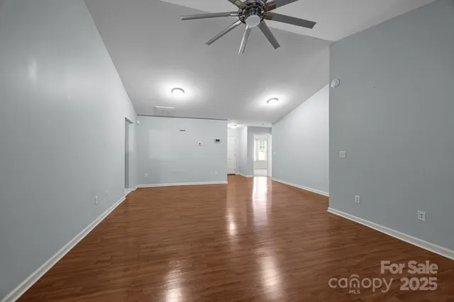 a view of a big room with wooden floor