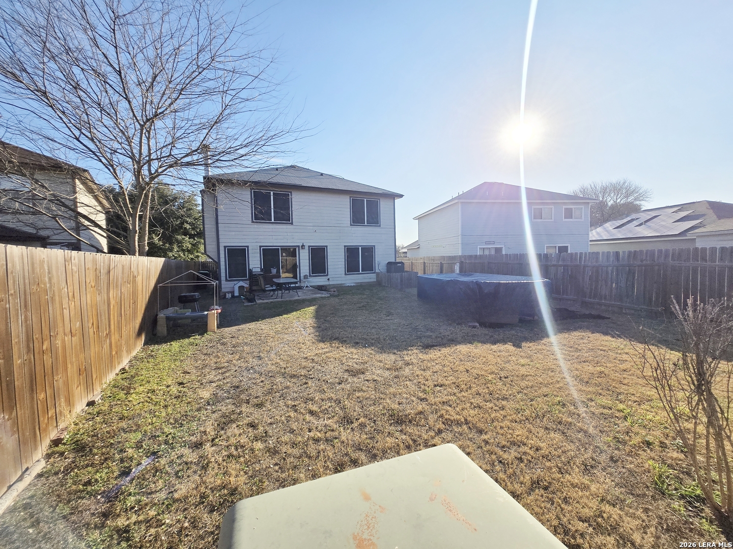 6606 Highland Grass Converse, TX 78109 - Photo 27 of 27 a view of a house with a yard covered in snow