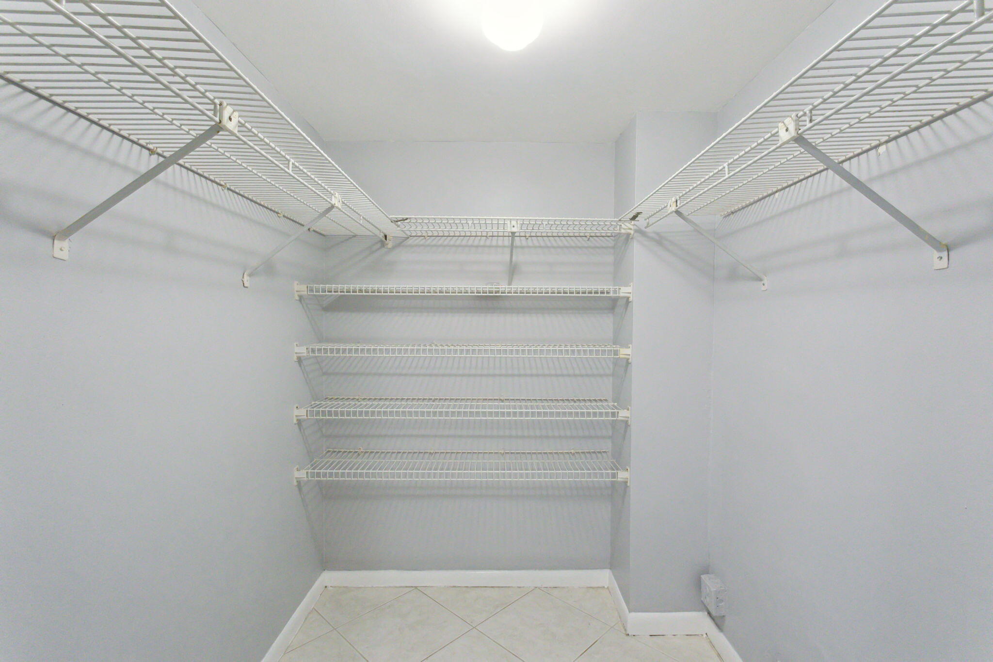 2900 Southwest 22nd Circle, Unit 221F Delray Beach, FL 33445 - Photo 12 of 25 Primary Closet
