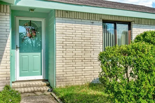 a view of a entryway door of the house