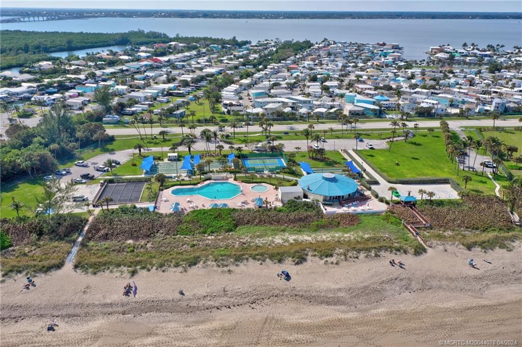 10725 South Ocean Drive, Unit 68 Jensen Beach, FL 34957 - Photo 25 of 27 an aerial view of a city