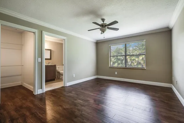 an empty room that has a window