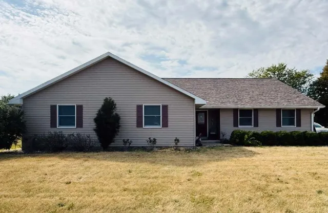 a house view with a garden