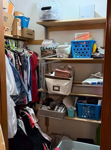 a room with lots of different colored cloths