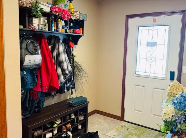 a room with lots of different colored cloths