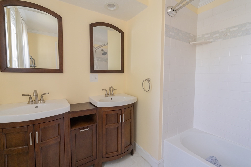 35 Neponset Street Canton, MA 02021 - Photo 15 of 29 a bathroom with a sink and a mirror