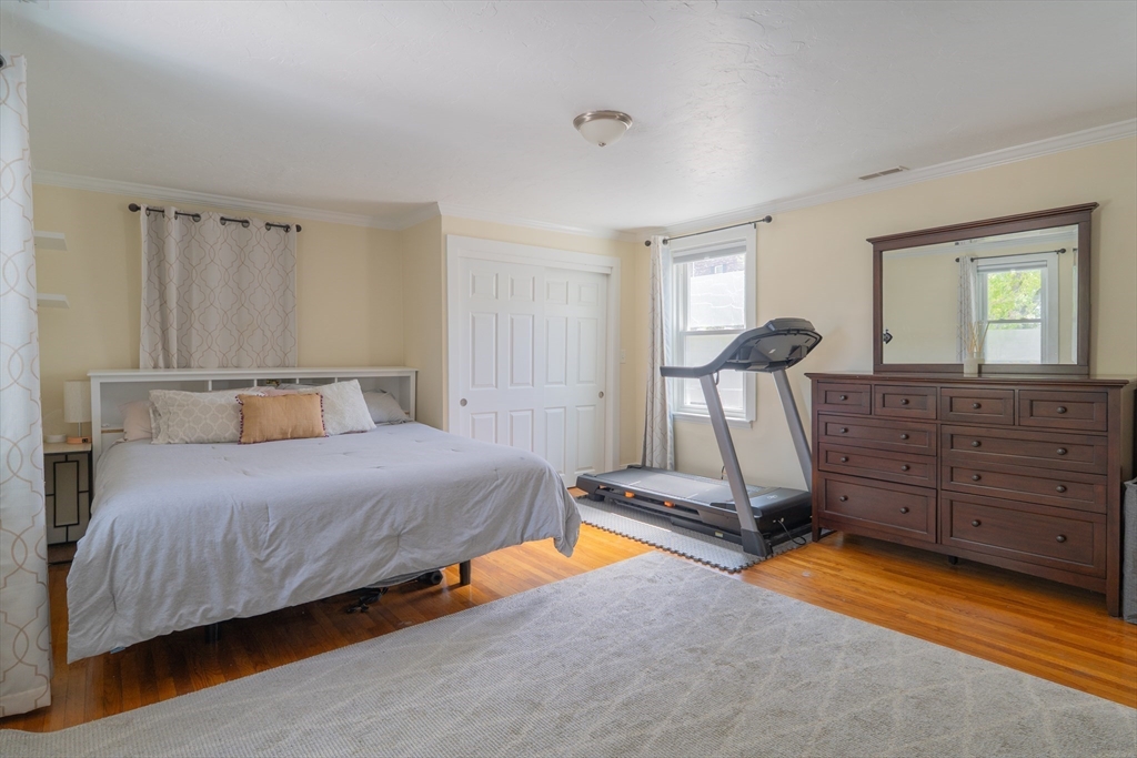 35 Neponset Street Canton, MA 02021 - Photo 16 of 29 a bedroom with a bed and window