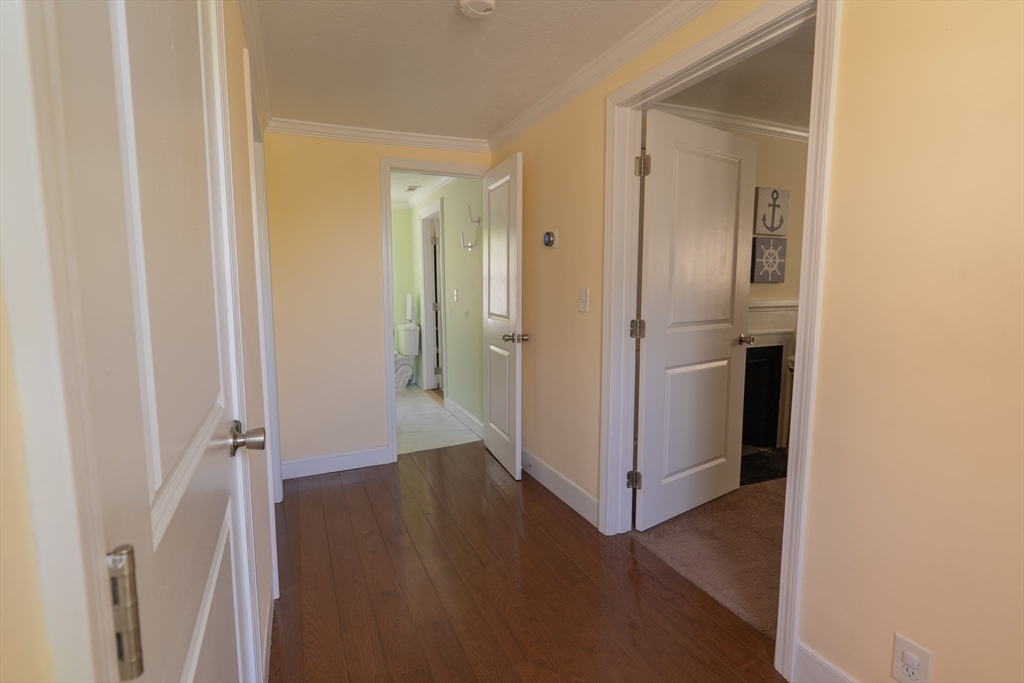 35 Neponset Street Canton, MA 02021 - Photo 18 of 29 a view of a hallway with wooden floor