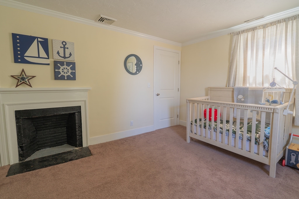 35 Neponset Street Canton, MA 02021 - Photo 19 of 29 a view of livingroom with furniture and fireplace