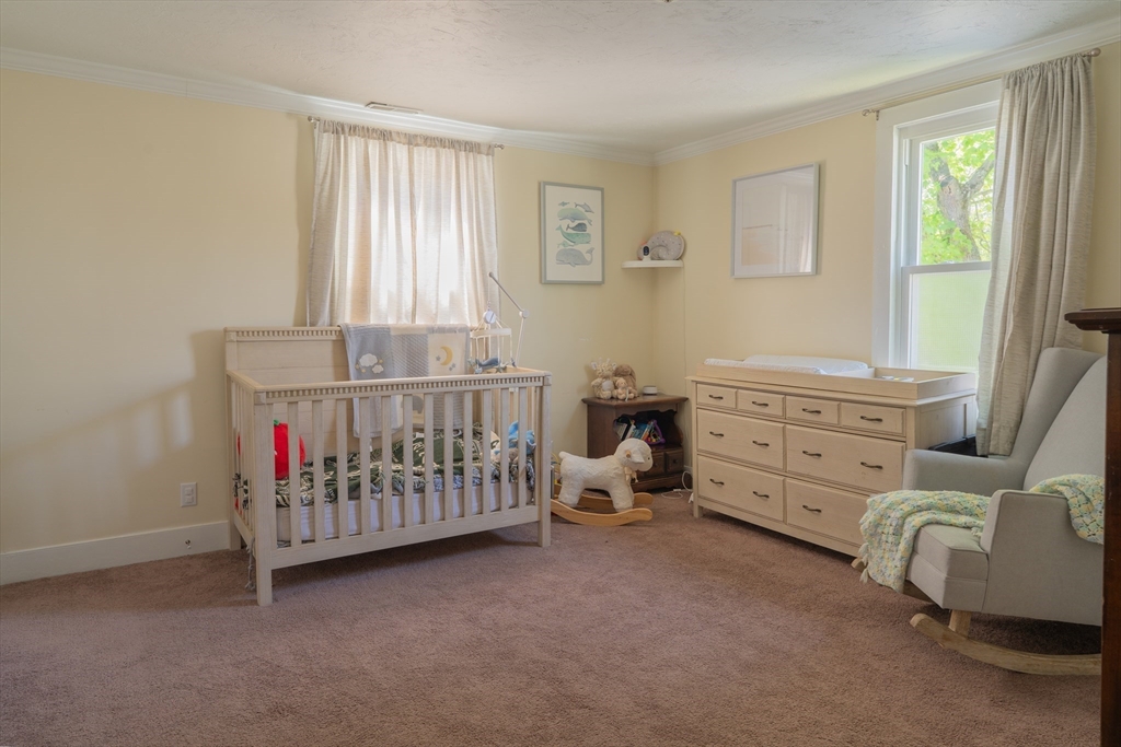 35 Neponset Street Canton, MA 02021 - Photo 20 of 29 a bedroom with furniture and a window