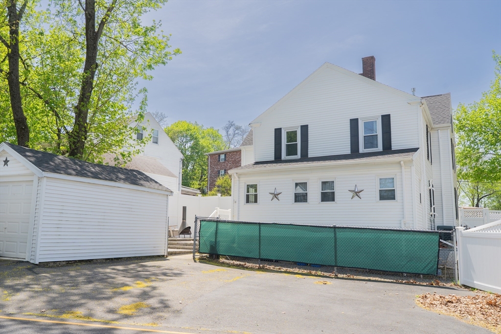 35 Neponset Street Canton, MA 02021 - Photo 2 of 29 a front view of a house with garage