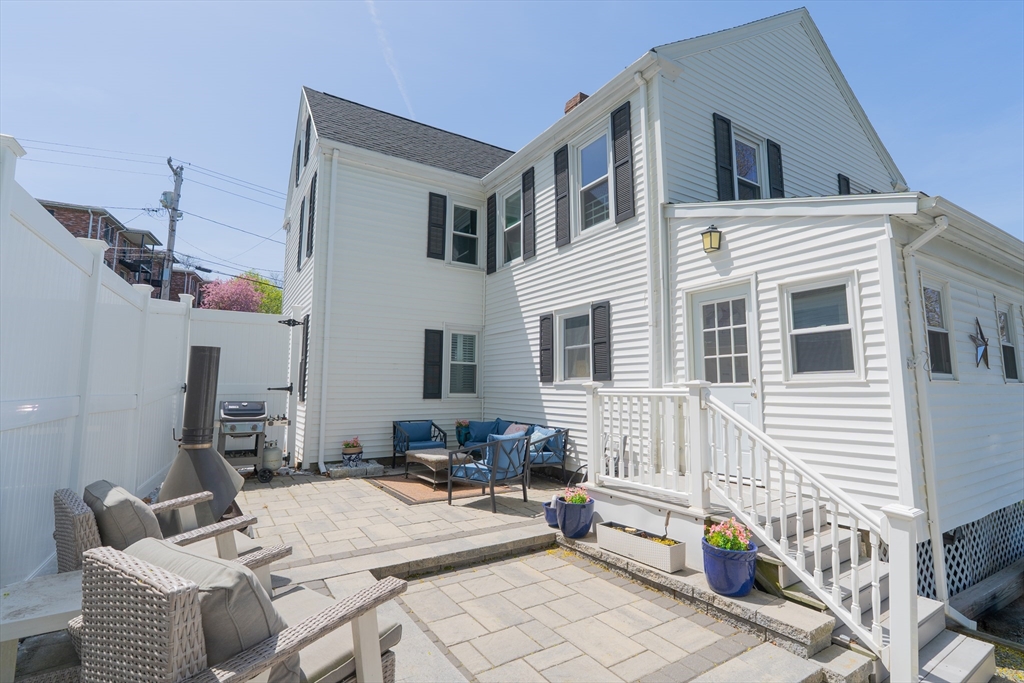 35 Neponset Street Canton, MA 02021 - Photo 3 of 29 a view of backyard with a patio and outdoor seating