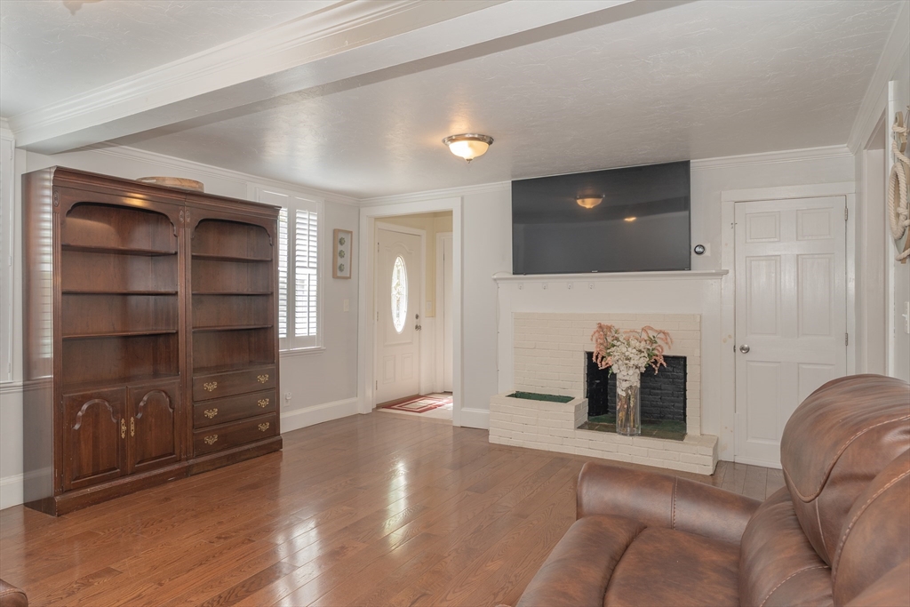 35 Neponset Street Canton, MA 02021 - Photo 8 of 29 a living room with furniture and a flat screen tv