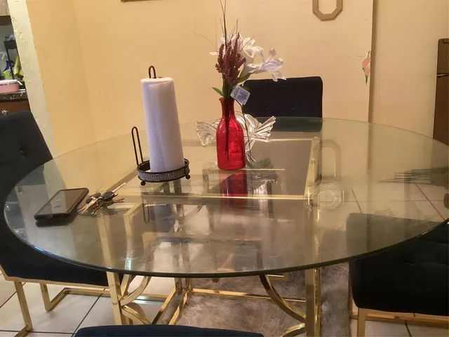 a view of a dining table cabinets