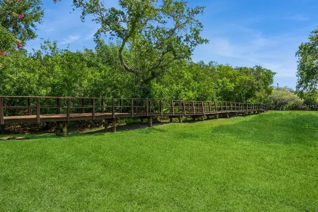 a view of balcony with yard