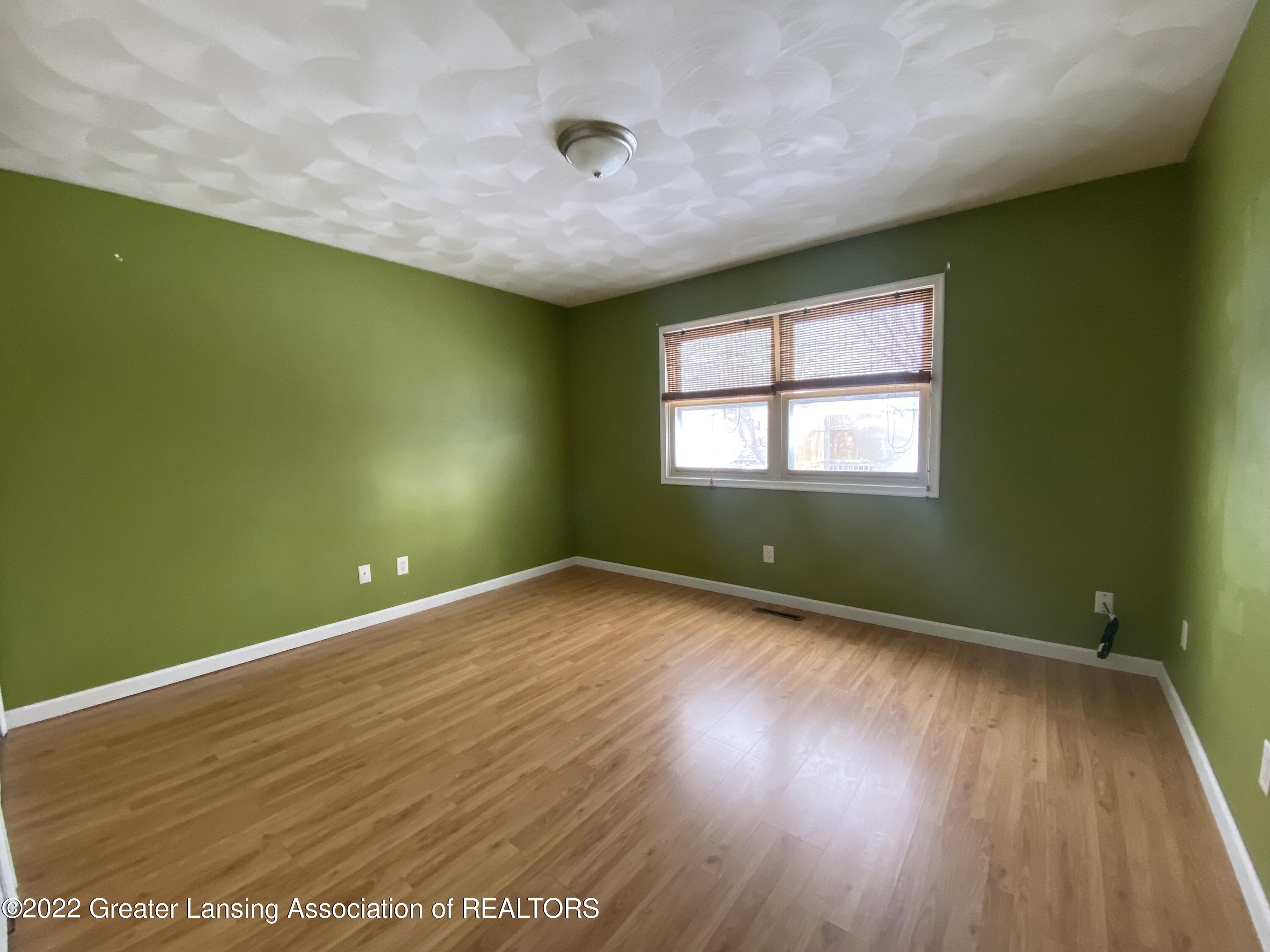 7015 North Aurelius Road Lansing, MI 48911 - Photo 12 of 30 Primary Bedroom