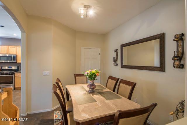 3701 East Northern Dancer Road Tucson, AZ 85739 - Photo 10 of 32 a view of a dining room with furniture