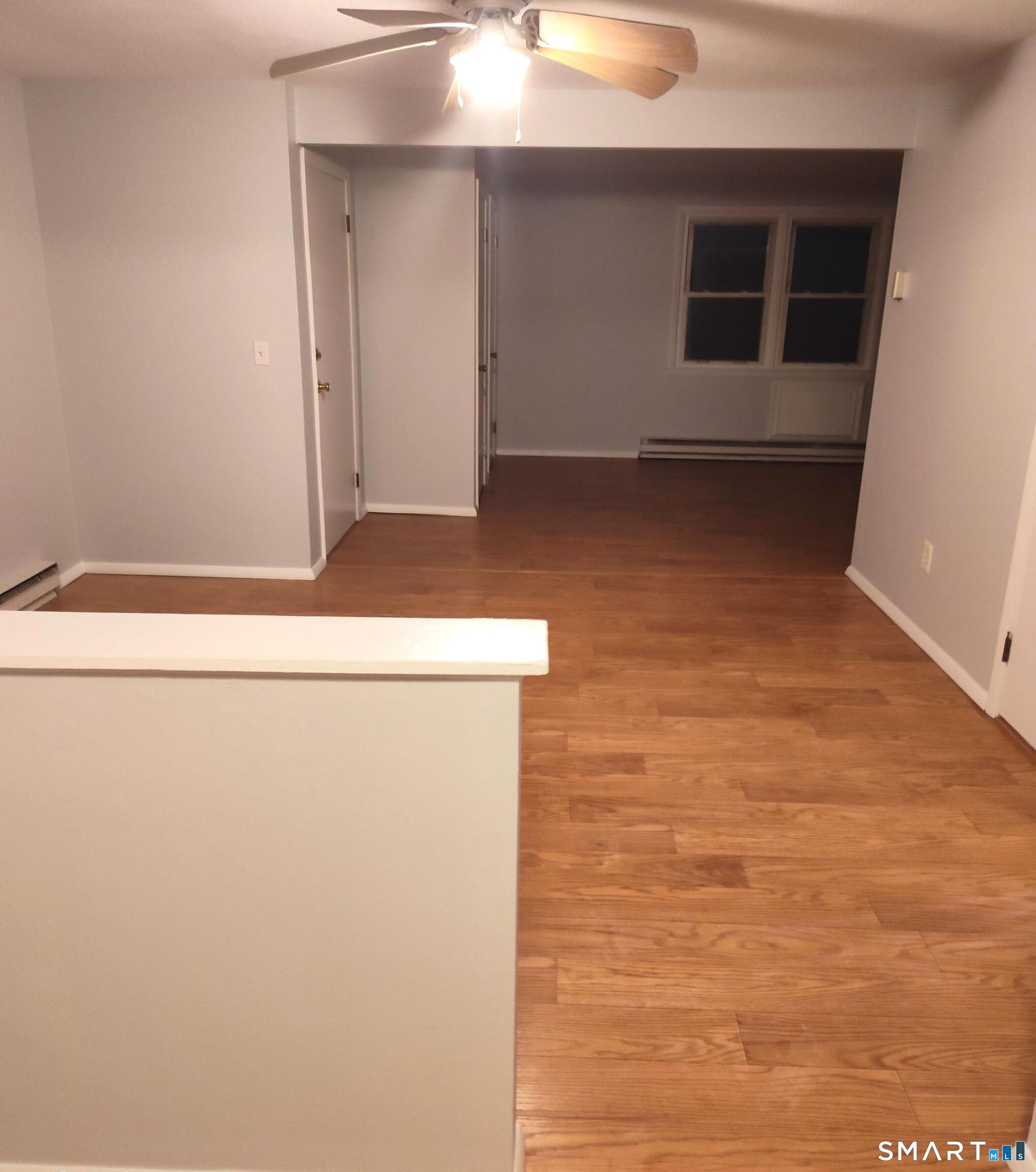 53 Hiltbrand Road, Unit 310 Bristol, CT 06010 - Photo 13 of 39 Dining & Living Areas View from Kitchen