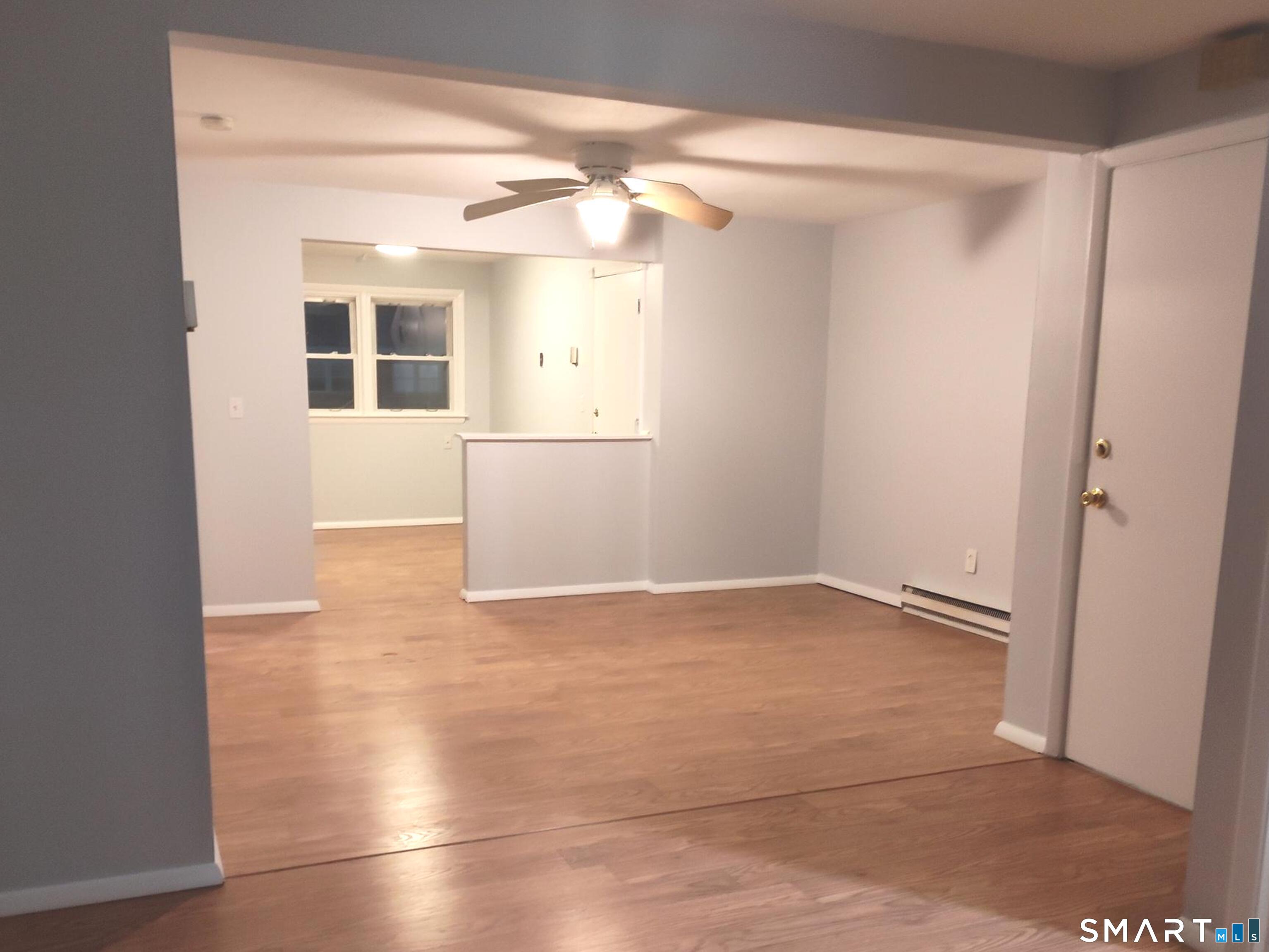 53 Hiltbrand Road, Unit 310 Bristol, CT 06010 - Photo 29 of 39 Dining Area & Kitchen View from Living Room