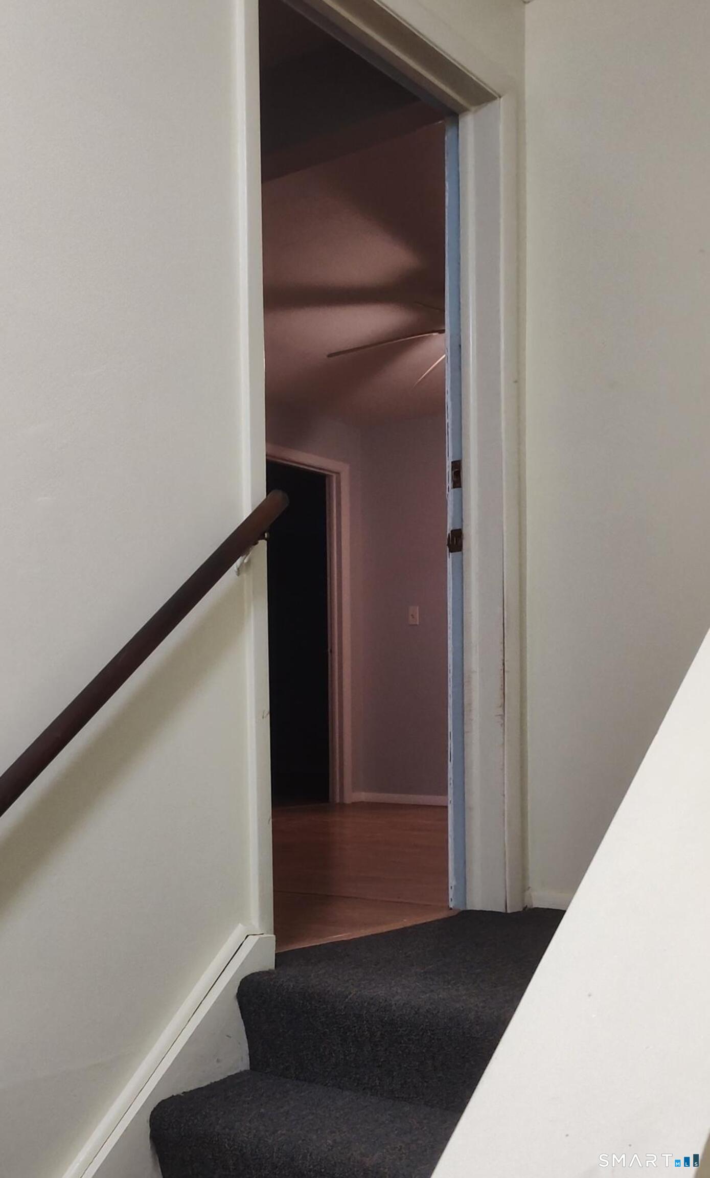 53 Hiltbrand Road, Unit 310 Bristol, CT 06010 - Photo 36 of 39 Courtyard Door Staircase