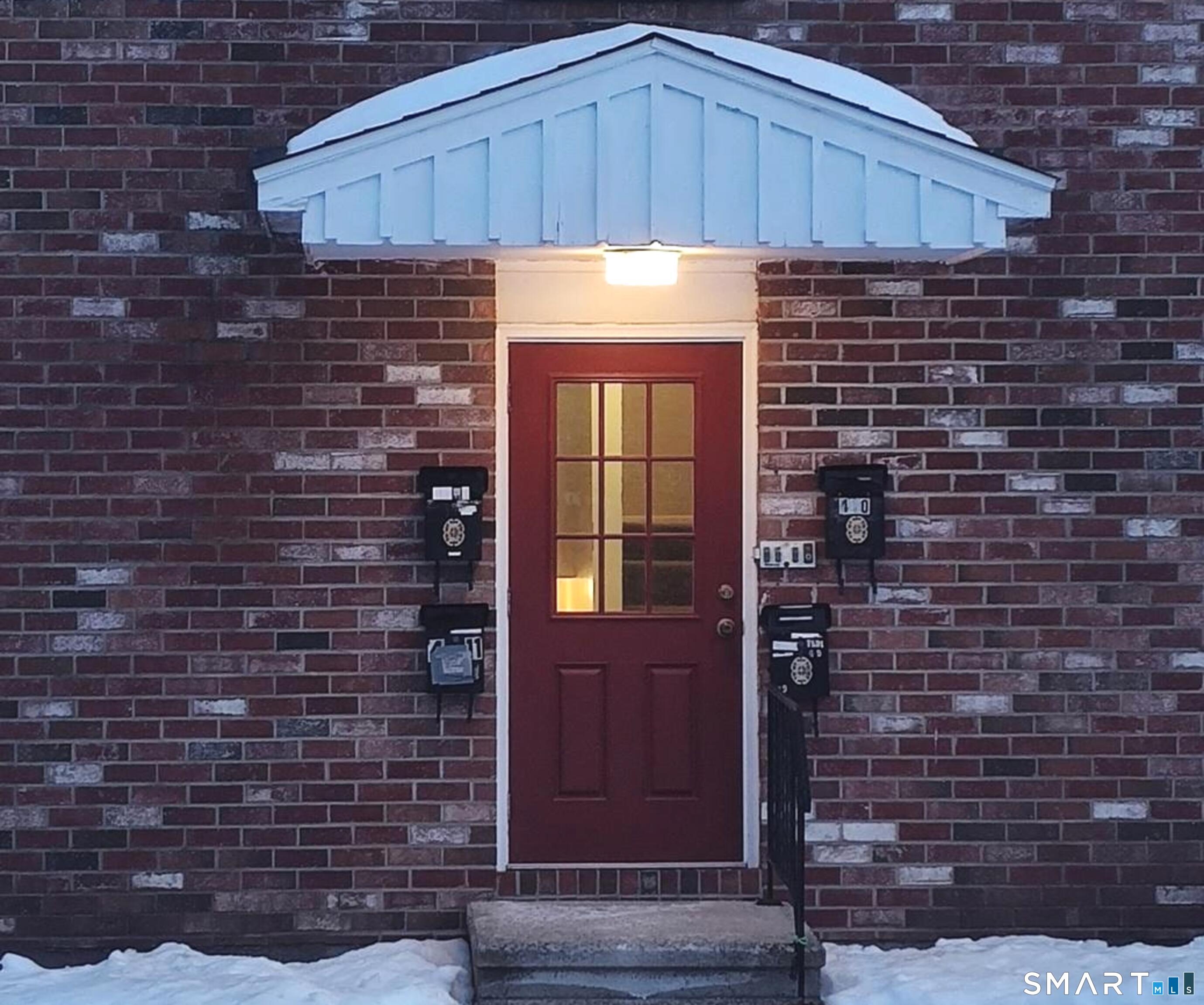 53 Hiltbrand Road, Unit 310 Bristol, CT 06010 - Photo 37 of 39 Courtyard Door View 1