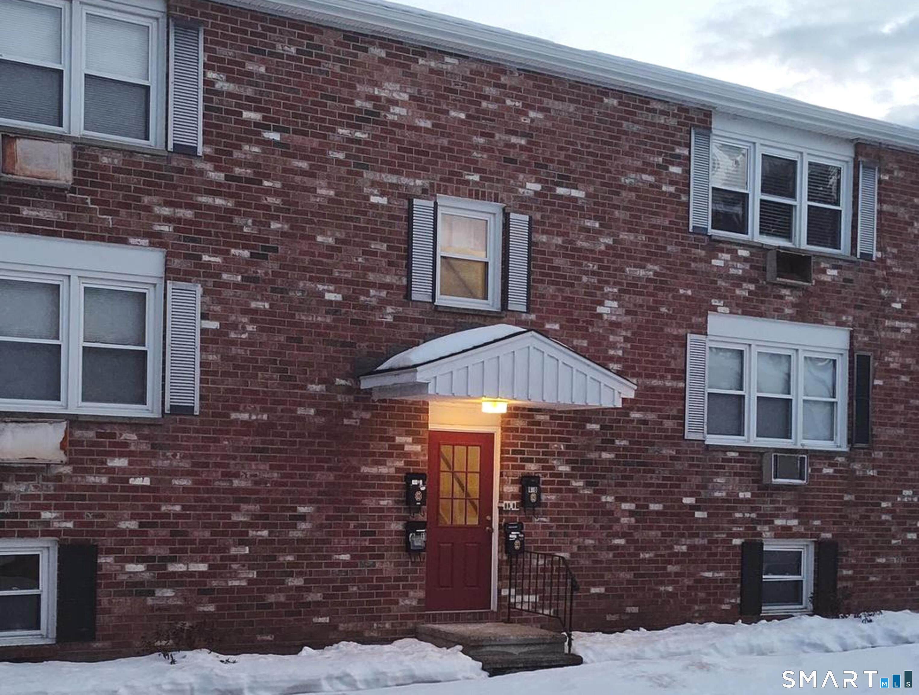 53 Hiltbrand Road, Unit 310 Bristol, CT 06010 - Photo 38 of 39 Courtyard Door View 2