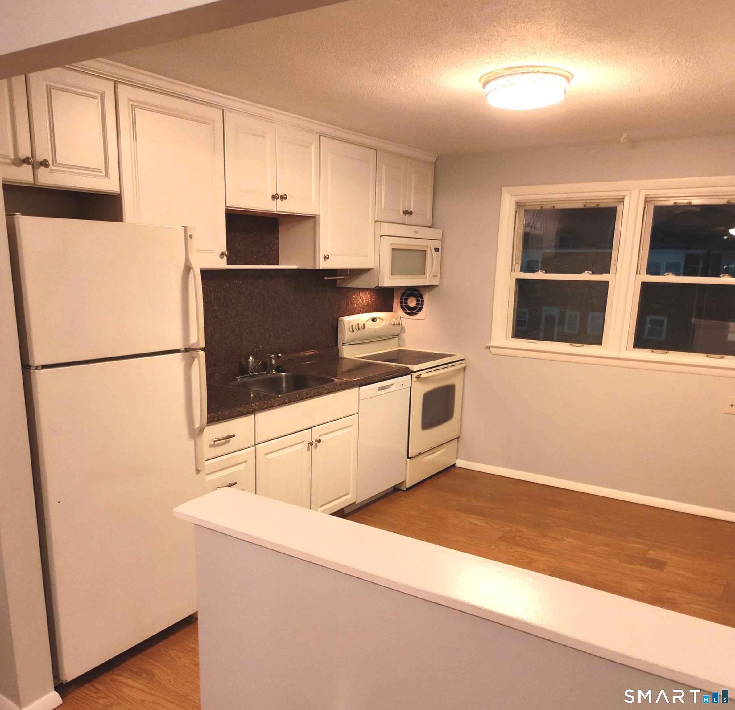 53 Hiltbrand Road, Unit 310 Bristol, CT 06010 - Photo 7 of 39 Kitchen View 1