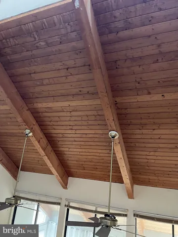 a view of a balcony with chairs