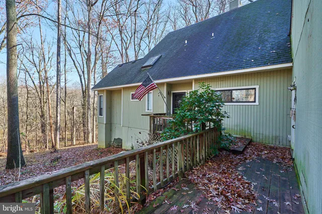 a view of a house with large windows