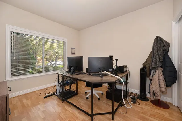 a kitchen with sink cabinets and window