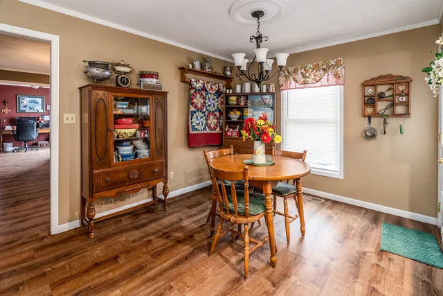 a kitchen with stainless steel appliances a refrigerator and a stove top oven