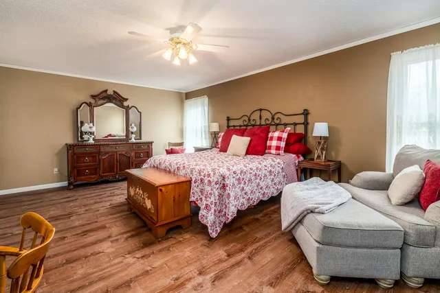 a view of a balcony with chairs and a table