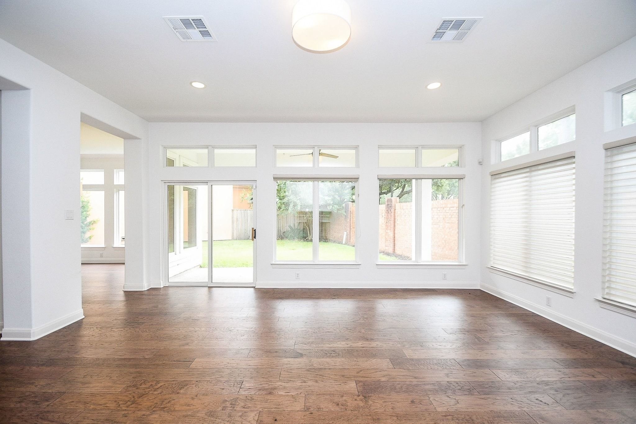 2826 Tudor Manor Houston, TX 77082 - Photo 37 of 37 Bright, open-concept floor plan featuring a seamless transition from the living room to the private side yard and covered patio.