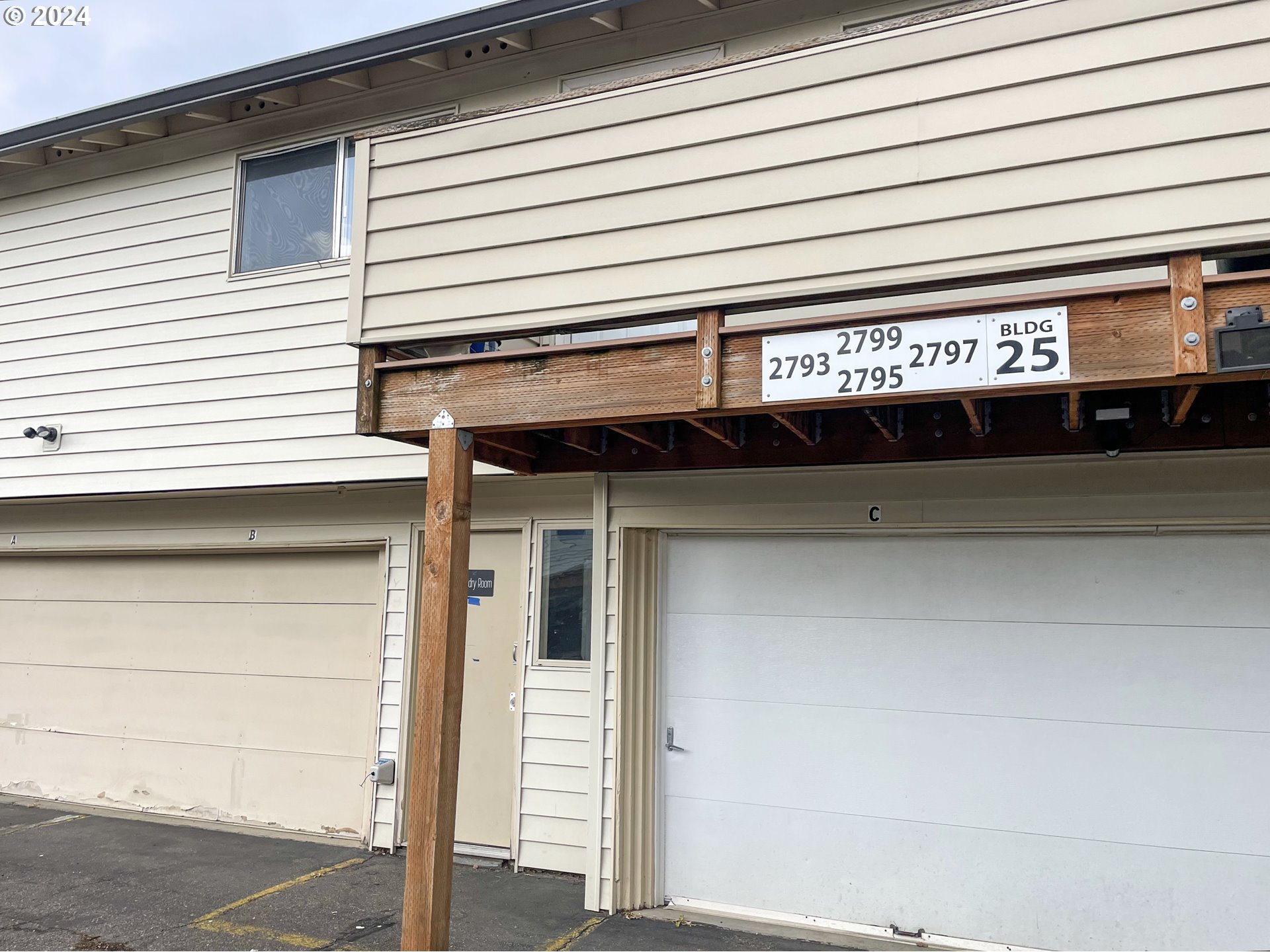 2797 Northeast Rene Avenue, Unit 25C Gresham, OR 97030 - Photo 3 of 9 a view of a door of the house