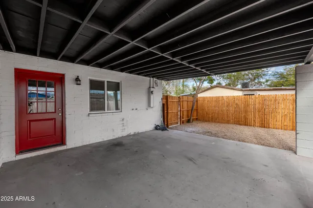 a view of an empty room with a garage