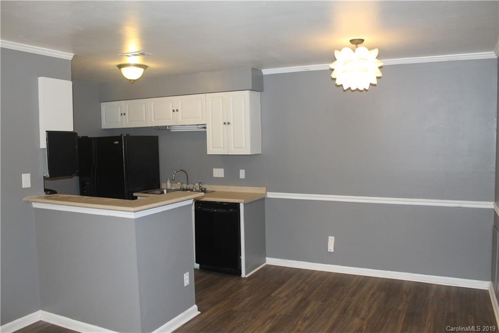 11203 Johnston Road Charlotte, NC 28226 - Photo 6 of 17 a view of a kitchen with a sink