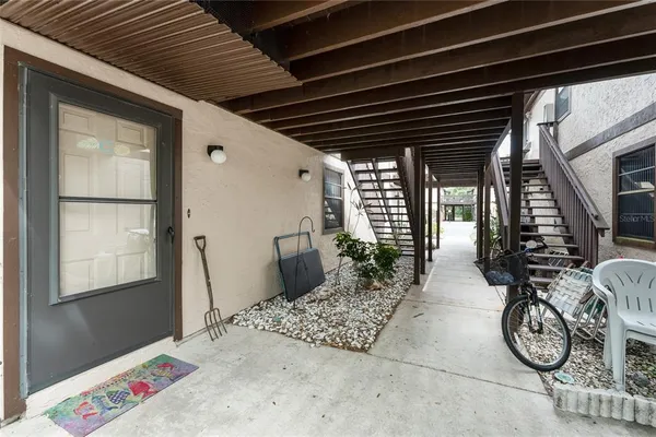 a view of entryway with a table and chairs