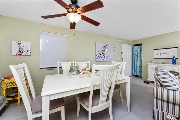 a view of a dining room with furniture