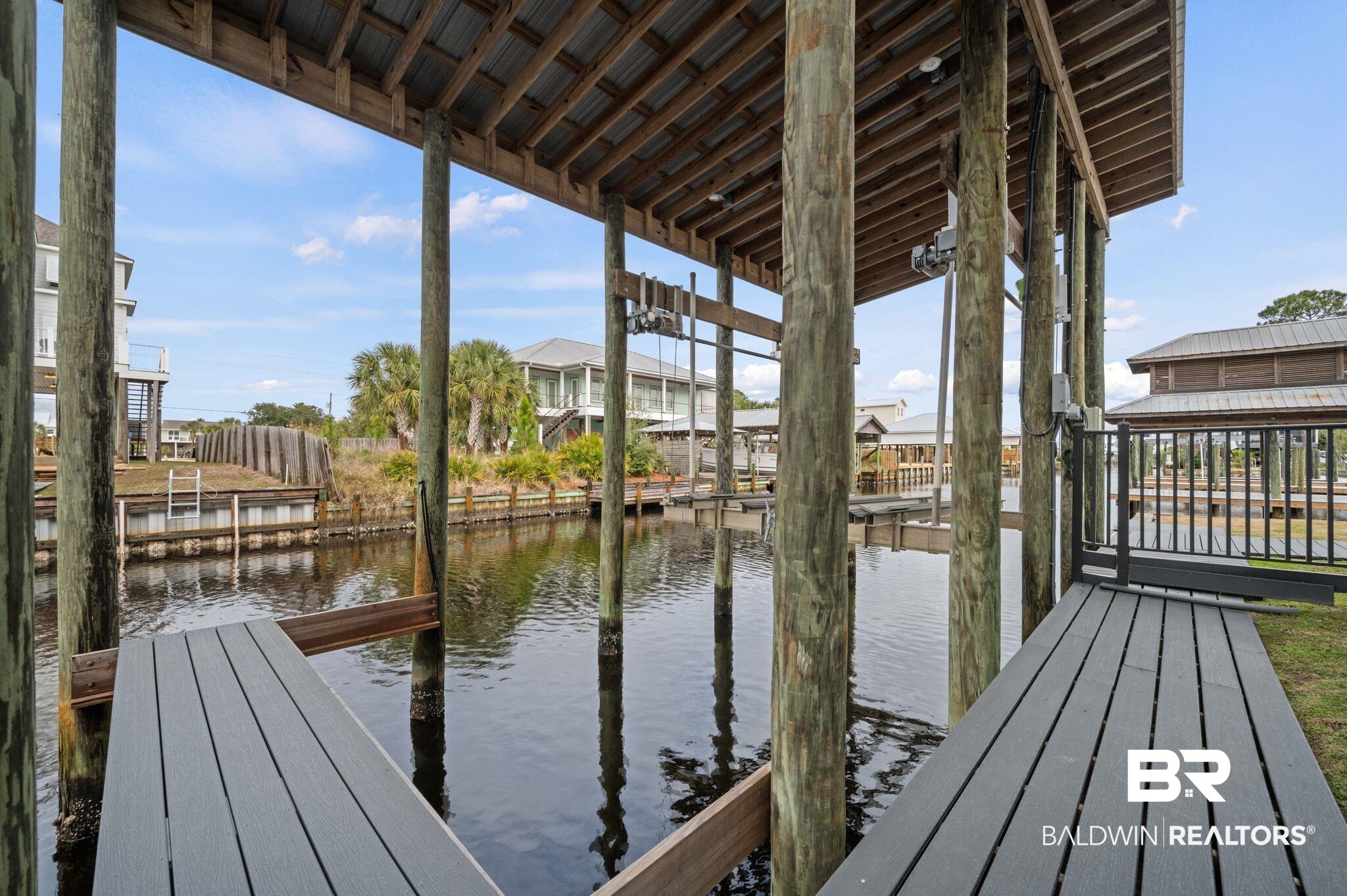 3840 Cotton Way Orange Beach, AL 36561 - Photo 62 of 75 View of dock with a water view