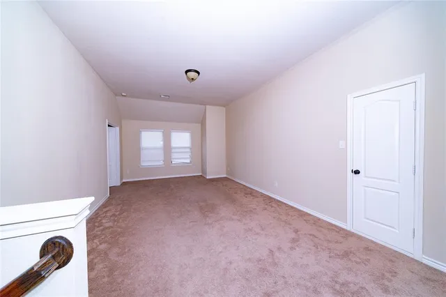 a view of a livingroom with a staircase