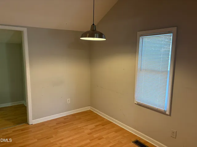 a kitchen with a stove and a microwave