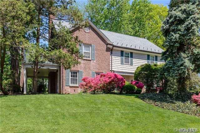 33 Orchard Farm Road Port Washington, NY 11050 - Photo 1 of 1 a view of a house with garden and yard