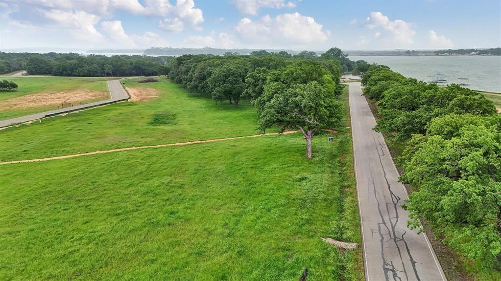 1516 Park Street Azle, TX 76020 - Photo 9 of 22 a view of a golf course with a lake