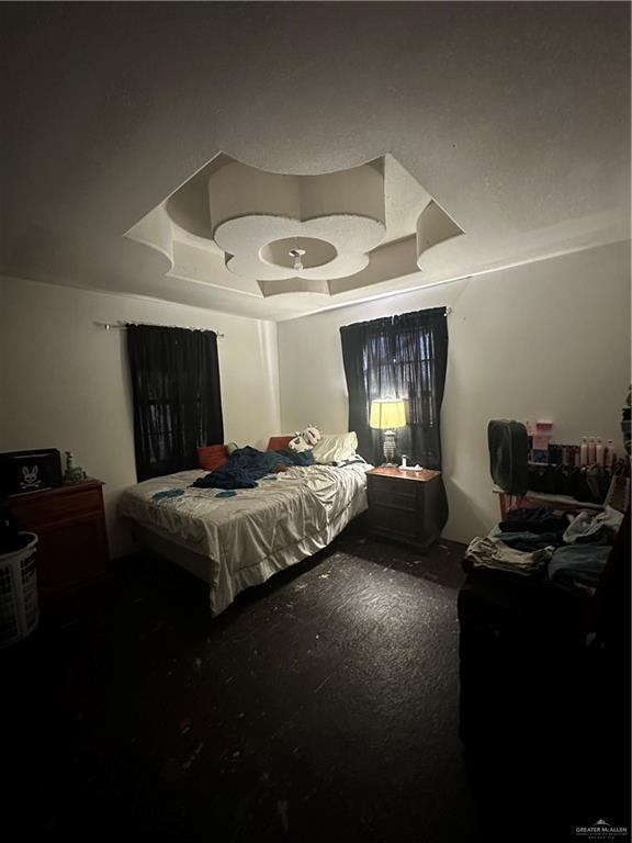 801 Earling Road Donna, TX 78537 - Photo 5 of 10 a bedroom with a bed and dresser