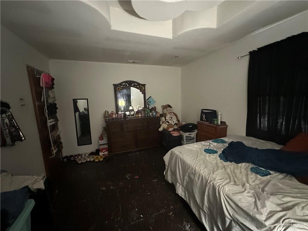801 Earling Road Donna, TX 78537 - Photo 6 of 10 a bedroom with bed and tv