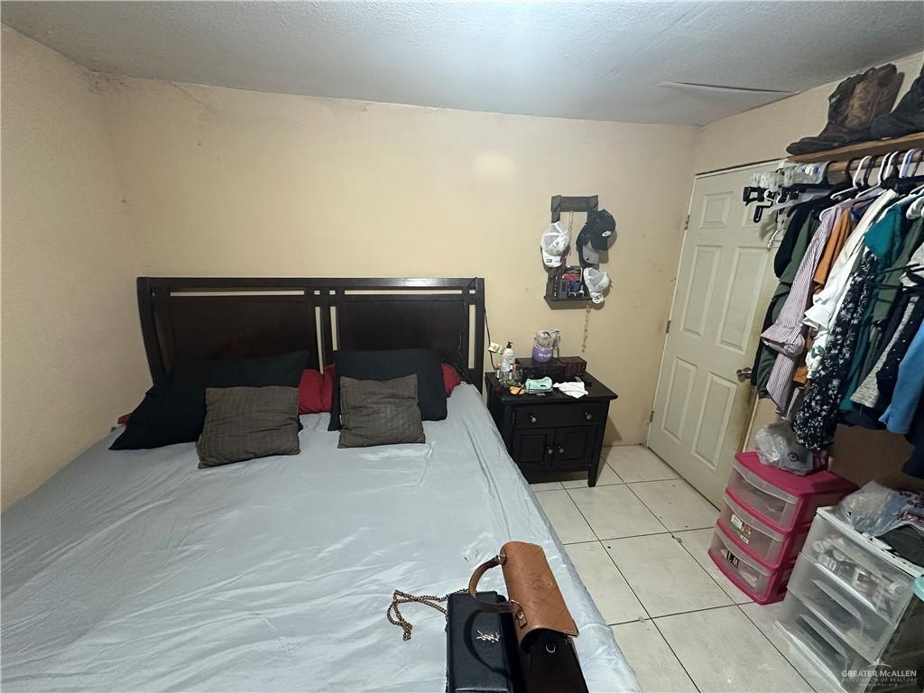 801 Earling Road Donna, TX 78537 - Photo 10 of 10 a bed room with a bed and a chair