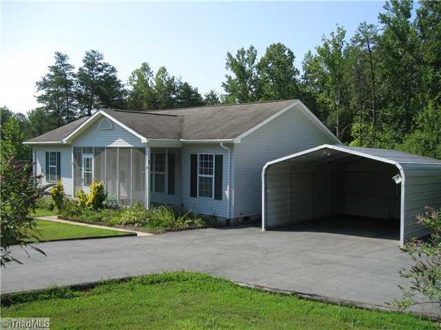 8297 Branson Road Stokesdale, NC 27357 - Photo 1 of 16 Exterior Front.