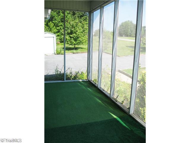 8297 Branson Road Stokesdale, NC 27357 - Photo 14 of 16 Other. Screened Porch with Ceiling Fan