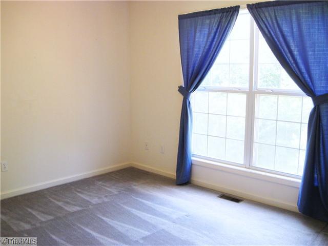 8297 Branson Road Stokesdale, NC 27357 - Photo 10 of 16 Master Bedroom.