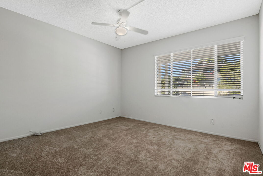 2695 Cordelia Road Los Angeles, CA 90049 - Photo 27 of 33 a view of an empty room with a window
